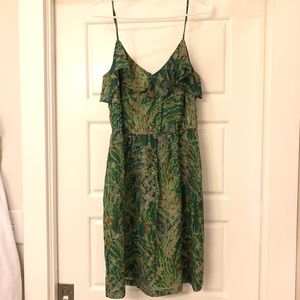 Beautiful green and gold dress by Cynthia Vincent
